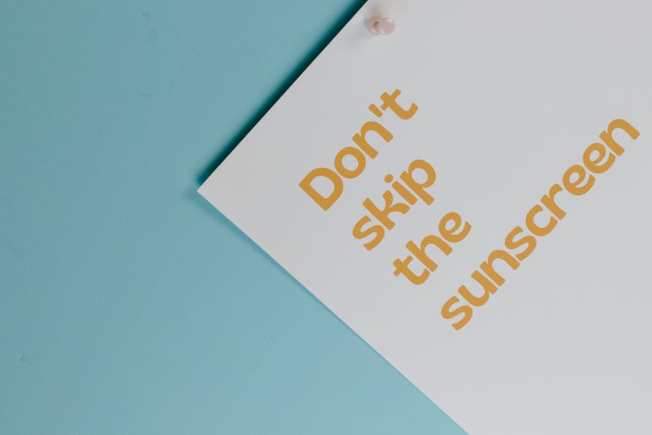 Minimalist design poster emphasizing the importance of sunscreen use.