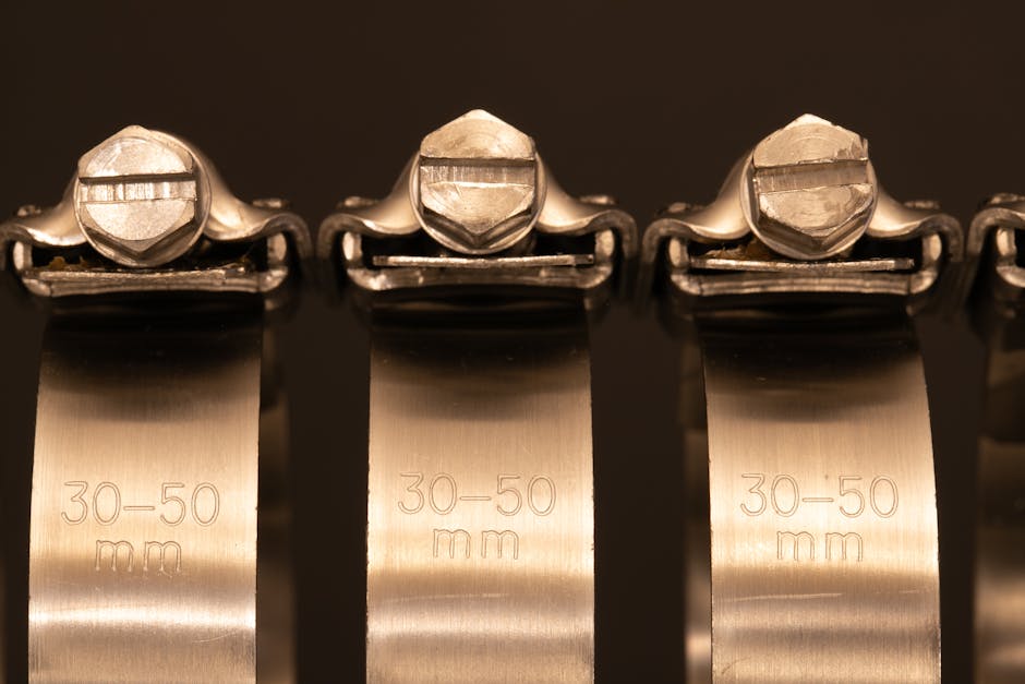 Detailed image of four metal clamps with 30-50 mm measurements.